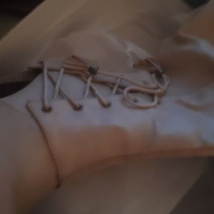 TORRID. NIB NEVER WORN SAND COLORED SIZE 9 WIDE CALF